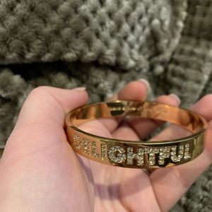 Gold Kate Spade bangle